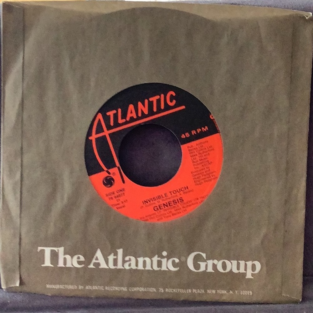 3/$20 Genesis “Invisible Touch” vintage vinyl 45rpm record